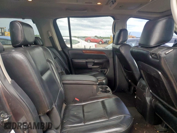2009 Infiniti QX56 with VIN 5N3AA08DX9N902005, listed as a Copart auction lot 60665925 with 191,472 mi miles and Salvage title. Bid and sale history available at DreamBid. Image 11.