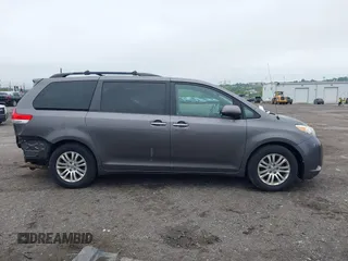 2014 Toyota Sienna XLE with VIN 5TDYK3DC0ES436502, listed as a IAAI auction lot 42180990 with 154,839 mi miles and . Bid and sale history available at DreamBid. Image 14.