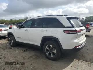 2022 Jeep Grand Cherokee with VIN 1C4RJYB65N8749633, listed as a Copart auction lot 51568275 with 27,913 mi miles and Salvage title. Bid and sale history available at DreamBid. Image 2.