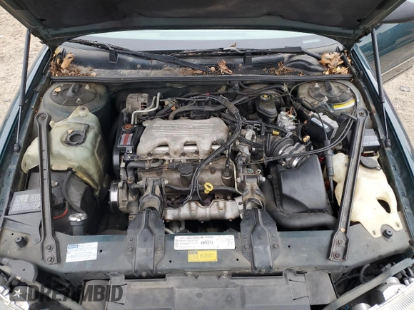 1997 Chevrolet Lumina LS with VIN 2G1WL52M3V9163567, listed as a Copart auction lot 82772324 with 191,852 mi miles and Salvage Title. Bid and sale history available at DreamBid. Image 12.