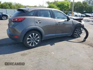 2019 Mazda CX-3 Touring z VIN JM1DKDC73K1406427, wystawiony jako Copart lot #57946715 z przebiegiem 71 838 mil mil oraz Szkody całkowita. Historia ofert i sprzedaży dostępna na DreamBid. Obrazek 3.