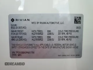 2023 Rivian R1S Adventure with VIN 7PDSGBBA3PN017791, listed as a Copart auction lot 82397374 with 20,733 mi miles and Salvage Title. Bid and sale history available at carsss.com. Image 16.