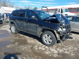 2014 Jeep Grand Cherokee Laredo with VIN 1C4RJFAG9EC516480, listed as a IAAI auction lot 41623584 with 121,652 mi miles. Bid and sale history available at carsss.com. Image 1.
