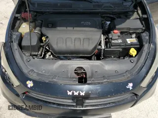 2013 Dodge Dart SE z VIN 1C3CDFAAXDD308484, wystawiony jako Copart lot #58911725 z przebiegiem 204 453 mil mil oraz Szkoda całkowita • Salvage title. Historia ofert i sprzedaży dostępna na DreamBid. Obrazek 11.