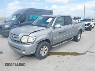 2004 Toyota Tundra SR5 with VIN 5TBET34114S453461, listed as a IAAI auction lot 41764793 with 165,907 mi miles and . Bid and sale history available at carsss.com. Image 2.