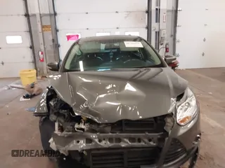 2013 Ford Focus Titanium with VIN 1FADP3J23DL265049, listed as a IAAI auction lot 41765621 with 100,550 mi miles and . Bid and sale history available at carsss.com. Image 12.