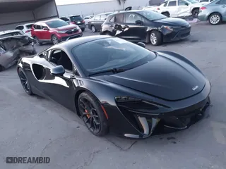 2023 McLaren Artura with VIN SBM16AEA4PW001449, listed as a IAAI auction lot 41347791 with 4,703 mi miles. Bid and sale history available at carsss.com. Image 1.