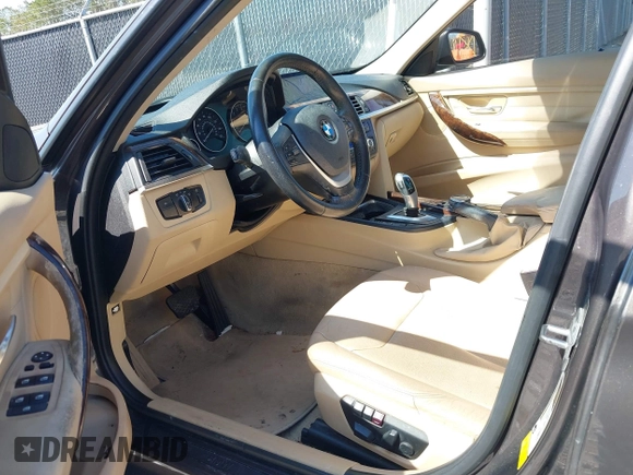 2014 BMW 3 Series 328i with VIN WBA3A5G57ENP28138, listed as a IAAI auction lot 41760371 with 147,897 mi miles and . Bid and sale history available at DreamBid. Image 5.