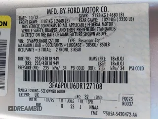 2013 Ford Fusion SE Hybrid with VIN 3FA6P0LU6DR127108, listed as a IAAI auction lot 42023529 with 250,057 mi miles. Bid and sale history available at carsss.com. Image 9.