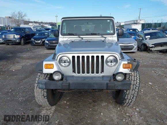 2003 Jeep Wrangler X with VIN 1J4FA39S33P363153, listed as a IAAI auction lot 41584805 with 160,676 mi miles. Bid and sale history available at carsss.com. Image 13.