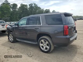 2015 Chevrolet Tahoe LT with VIN 1GNSCBKC1FR240186, listed as a Copart auction lot 64741425 with 110,357 mi miles and Salvage title. Bid and sale history available at DreamBid. Image 2.
