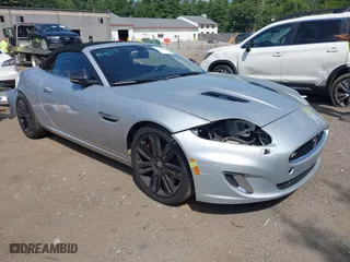 2012 Jaguar XK with VIN SAJWA4EC9CMB45251, listed as a IAAI auction lot 40242636 with 61,538 mi miles. Bid and sale history available at carsss.com. Image 1.