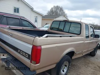 1996 Ford F-150 Special with VIN 1FTEX15N3TKA33031, listed as a IAAI auction lot 41874856 with 350,940 mi miles. Bid and sale history available at carsss.com. Image 4.
