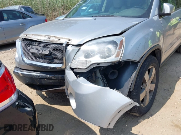 2010 GMC Acadia SLT1 with VIN 1GKLVMED2AJ199716, listed as a IAAI auction lot 42154966 with 200,493 mi miles. Bid and sale history available at carsss.com. Image 6.