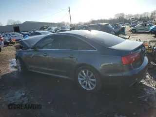 2015 Audi A6 3.0T Prestige with VIN WAUHGAFC0FN038956, listed as a Copart auction lot 49525755 with 135,972 mi miles and Salvage Title. Bid and sale history available at carsss.com. Image 2.