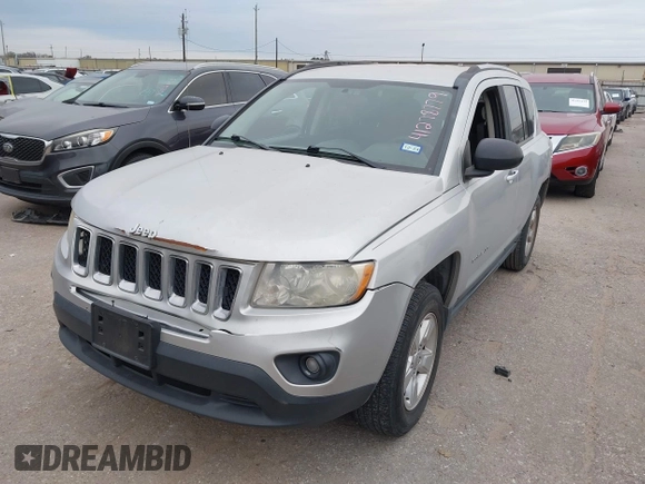 2013 Jeep Compass Sport with VIN 1C4NJCBA7DD100332, listed as a IAAI auction lot 41278779 with 161,668 mi miles. Bid and sale history available at carsss.com. Image 2.