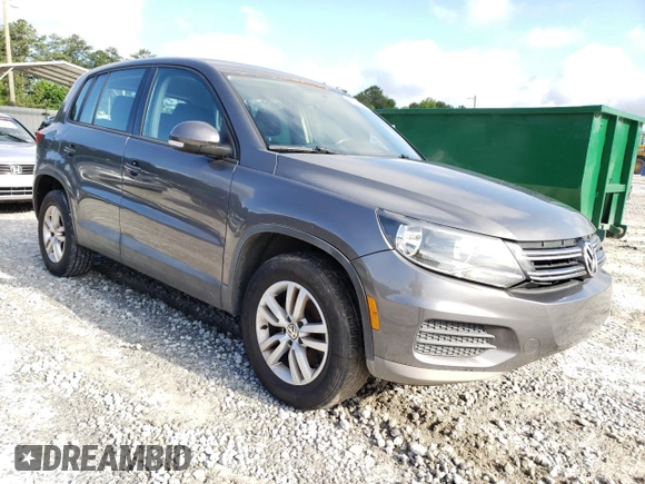 2014 Volkswagen Tiguan S z VIN WVGBV3AX2EW519798, wystawiony jako Copart lot #60316895 z przebiegiem 182 002 mil mil oraz Czysty tytuł • Clean title. Historia ofert i sprzedaży dostępna na DreamBid. Obrazek 4.