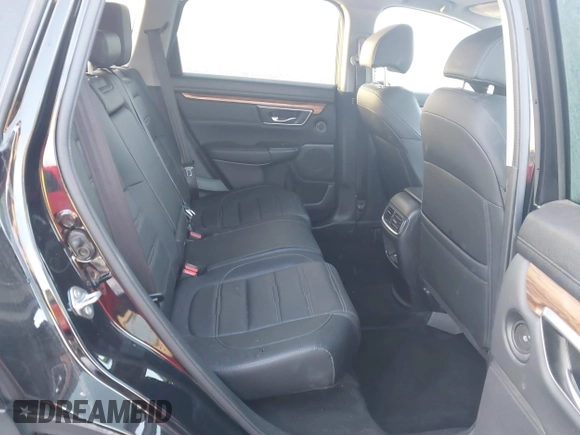 2019 Honda CR-V Touring with VIN 7FARW2H9XKE012394, listed as a IAAI auction lot 41092564 with 49,527 mi miles and . Bid and sale history available at DreamBid. Image 8.