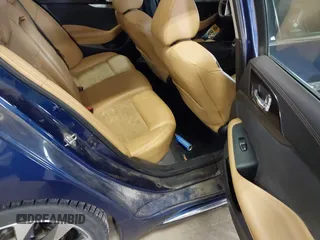 2016 Nissan Maxima SL with VIN 1N4AA6AP6GC425575, listed as a IAAI auction lot 41463093 with 135,920 mi miles and . Bid and sale history available at DreamBid. Image 8.