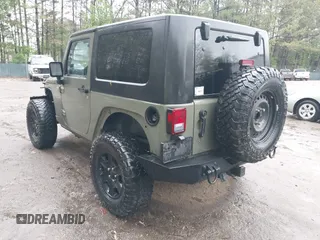 2007 Jeep Wrangler X with VIN 1J4FA24127L231409, listed as a IAAI auction lot 41971429 with 181,855 mi miles and . Bid and sale history available at carsss.com. Image 3.