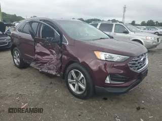 2019 Ford Edge SEL with VIN 2FMPK4J92KBB34891, listed as a Copart auction lot 60050945 with 104,942 mi miles and Salvage title. Bid and sale history available at DreamBid. Image 4.
