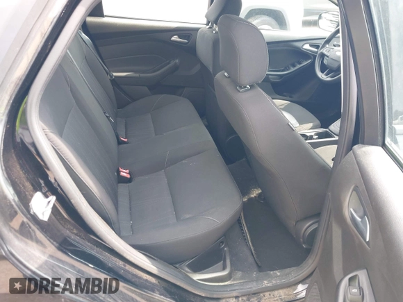 2016 Ford Focus SE z VIN 1FADP3F2XGL312445, wystawiony jako IAAI lot #42288210 z przebiegiem 64 115 mil mil oraz . Historia ofert i sprzedaży dostępna na DreamBid. Obrazek 8.