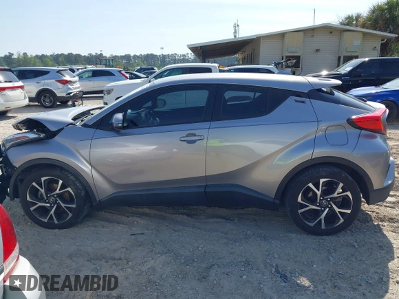 2018 Toyota C-HR XLE with VIN NMTKHMBX1JR026901, listed as a IAAI auction lot 42021943 with 78,217 mi miles and . Bid and sale history available at DreamBid. Image 14.