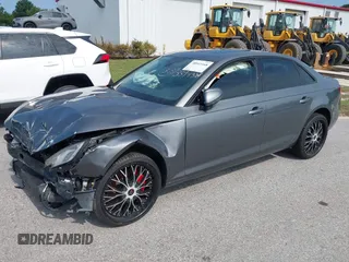 2017 Audi A4 Premium z VIN WAUGNAF42HA025565, wystawiony jako IAAI lot #38943168 z przebiegiem 103 953 mil mil oraz . Historia ofert i sprzedaży dostępna na DreamBid. Obrazek 2.