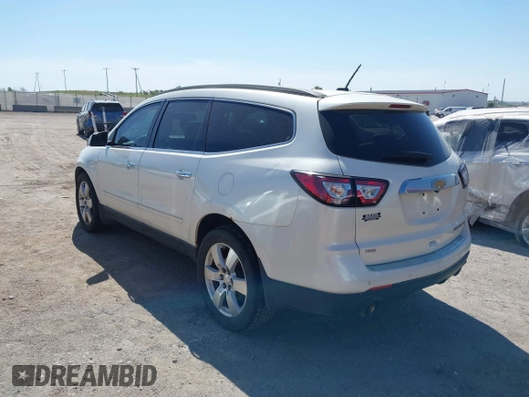 2013 Chevrolet Traverse LTZ z VIN 1GNKVLKD8DJ107168, wystawiony jako IAAI lot #42242078 z przebiegiem 271 640 mil mil oraz . Historia ofert i sprzedaży dostępna na DreamBid. Obrazek 3.
