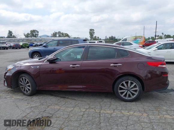 2019 Kia Optima LX z VIN 5XXGT4L37KG354649, wystawiony jako IAAI lot #42130410 z przebiegiem 61 315 mil mil oraz . Historia ofert i sprzedaży dostępna na DreamBid. Obrazek 13.