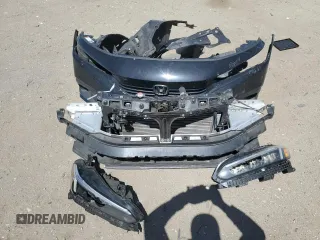 2023 Honda Civic Sport z VIN 2HGFE2F53PH558023, wystawiony jako Copart lot #54541695 z przebiegiem Nie podano mil oraz Szkoda całkowita • Salvage title. Historia ofert i sprzedaży dostępna na DreamBid. Obrazek 12.
