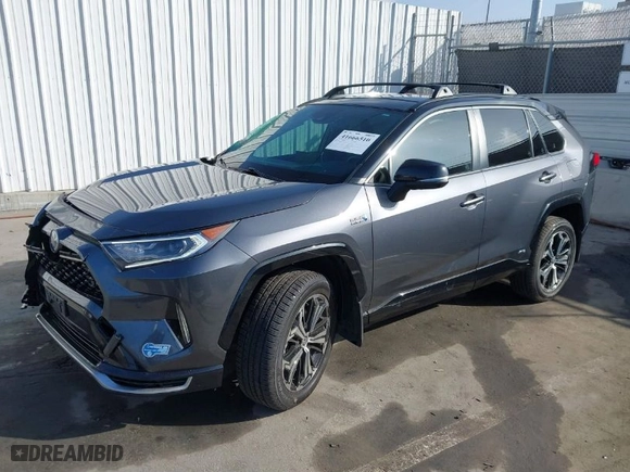 2021 Toyota RAV4 Prime XSE with VIN JTMFB3FV7MD009740, listed as a IAAI auction lot 41666510 with 59,950 mi miles. Bid and sale history available at carsss.com. Image 2.
