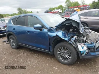 2017 Mazda CX-5 Touring z VIN JM3KFBCL9H0224962, wystawiony jako IAAI lot #42312104 z przebiegiem Nie podano mil oraz . Historia ofert i sprzedaży dostępna na DreamBid. Obrazek 14.