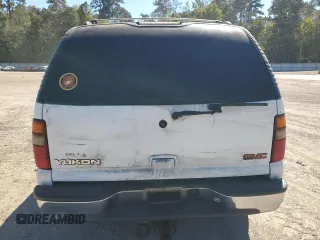 2002 GMC Yukon SLT with VIN 1GKEC13Z32R325662, listed as a Copart auction lot 76667074 with 0 mi miles and Salvage Title. Bid and sale history available at carsss.com. Image 6.