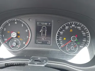 2014 Volkswagen Passat SE z VIN 1VWBT7A39EC097705, wystawiony jako IAAI lot #42447661 z przebiegiem 72 607 mil mil oraz . Historia ofert i sprzedaży dostępna na DreamBid. Obrazek 7.
