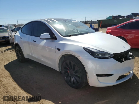 2024 Tesla Model Y Performance with VIN 7SAYGDEF6RA284171, listed as a Copart auction lot 50317205 with 6,870 mi miles and Salvage Title. Bid and sale history available at DreamBid. Image 4.