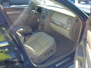 2007 Lincoln MKZ z VIN 3LNHM26T07R653177, wystawiony jako IAAI lot #41571111 z przebiegiem 124 929 mil mil oraz . Historia ofert i sprzedaży dostępna na DreamBid. Obrazek 5.
