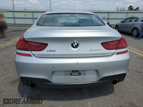 2015 BMW 6 Series 640i xDrive z VIN WBA6B8C53FD453229, wystawiony jako Copart lot #60371214 z przebiegiem 116 624 mil mil oraz Szkoda całkowita • Salvage title. Historia ofert i sprzedaży dostępna na DreamBid. Obrazek 6.