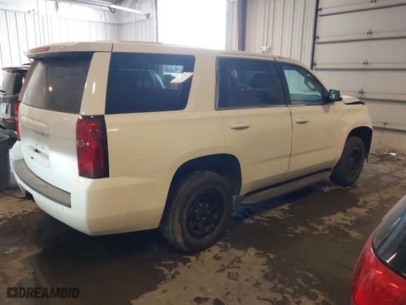 2018 Chevrolet Tahoe Commercial with VIN 1GNSKDEC7JR240082, listed as a IAAI auction lot 41608557 with 111,834 mi miles. Bid and sale history available at carsss.com. Image 4.