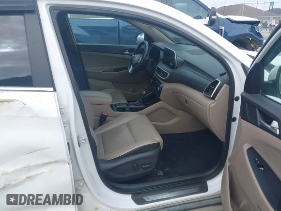 2019 Hyundai Tucson Ultimate with VIN KM8J3CALXKU016834, listed as a IAAI auction lot 40970606 with 104,208 mi miles. Bid and sale history available at carsss.com. Image 5.