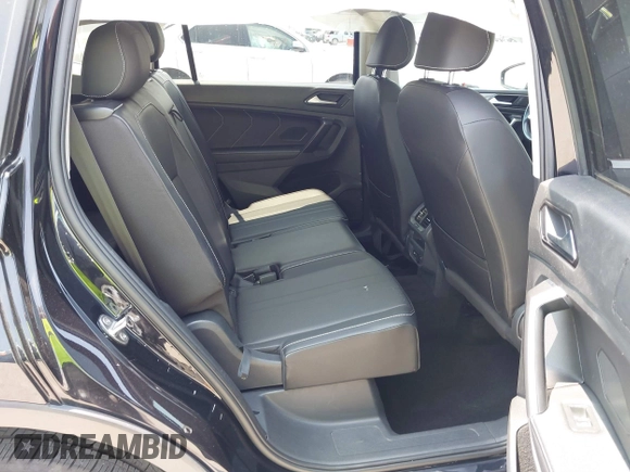 2023 Volkswagen Tiguan SE with VIN 3VVNB7AX5PM017938, listed as a IAAI auction lot 42453818 with 177,906 mi miles and . Bid and sale history available at DreamBid. Image 8.