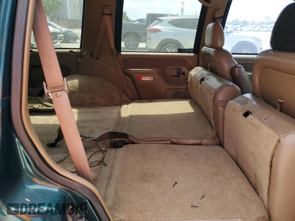 1995 Chevrolet Tahoe z VIN 1GNEC13K1SJ439759, wystawiony jako Copart lot #57784845 z przebiegiem 190 566 mil mil oraz Czysty tytuł • Clean title. Historia ofert i sprzedaży dostępna na DreamBid. Obrazek 10.