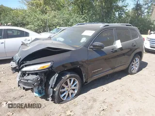 2016 Jeep Cherokee Limited z VIN 1C4PJMDS4GW124486, wystawiony jako IAAI lot #40503562 z przebiegiem 106 600 mil mil oraz . Historia ofert i sprzedaży dostępna na DreamBid. Obrazek 2.