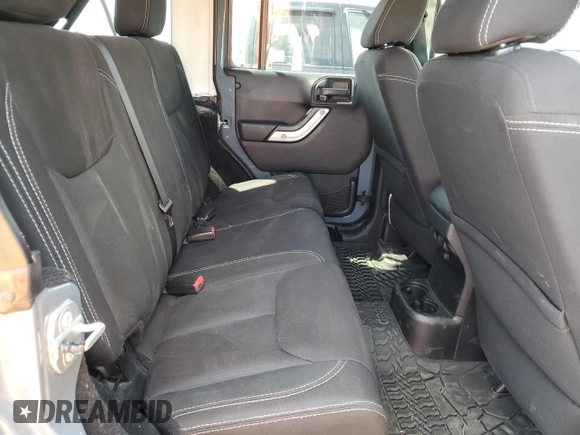 2014 Jeep Wrangler Unlimited Sahara with VIN 1C4BJWEG7EL228307, listed as a Copart auction lot 58663455 with 188,024 mi miles and Salvage title. Bid and sale history available at DreamBid. Image 11.