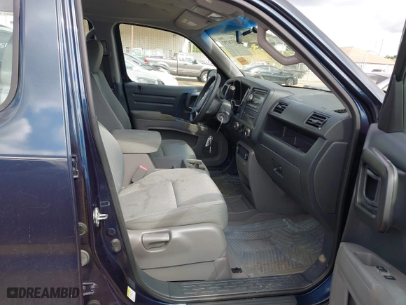 2011 Honda Ridgeline RT with VIN 5FPYK1F20BB001723, listed as a IAAI auction lot 40376797 with 167,706 mi miles. Bid and sale history available at carsss.com. Image 5.