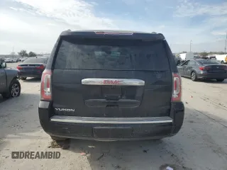 2015 GMC Yukon Denali with VIN 1GKS1CKJ2FR699959, listed as a Copart auction lot 42035195 with 0 mi miles and Salvage Title. Bid and sale history available at carsss.com. Image 6.