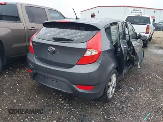 2012 Hyundai Accent SE with VIN KMHCU5AE9CU013458, listed as a IAAI auction lot 41475986 with 88,592 mi miles. Bid and sale history available at carsss.com. Image 4.