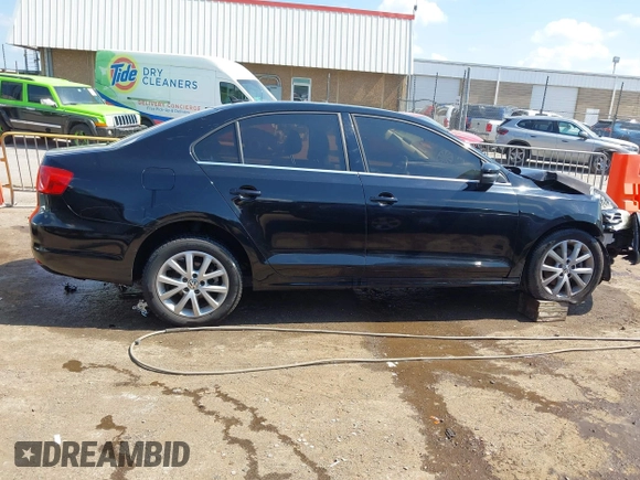 2013 Volkswagen Jetta SE z VIN 3VWDP7AJ3DM438668, wystawiony jako IAAI lot #42235014 z przebiegiem 128 406 mil mil oraz . Historia ofert i sprzedaży dostępna na DreamBid. Obrazek 13.