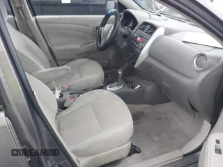 2015 Nissan Versa SV with VIN 3N1CN7AP0FL881056, listed as a IAAI auction lot 42106423 with 134,760 mi miles. Bid and sale history available at carsss.com. Image 5.
