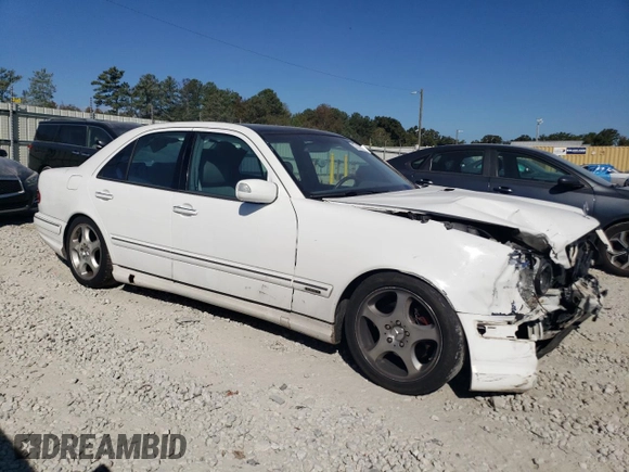 2001 Mercedes-Benz E-Class with VIN WDBJF70J11B285493, listed as a Copart auction lot 77170114 with 226,226 mi miles and Salvage Title. Bid and sale history available at carsss.com. Image 4.